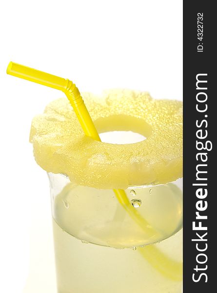 Pineapple juice in the glass on white background