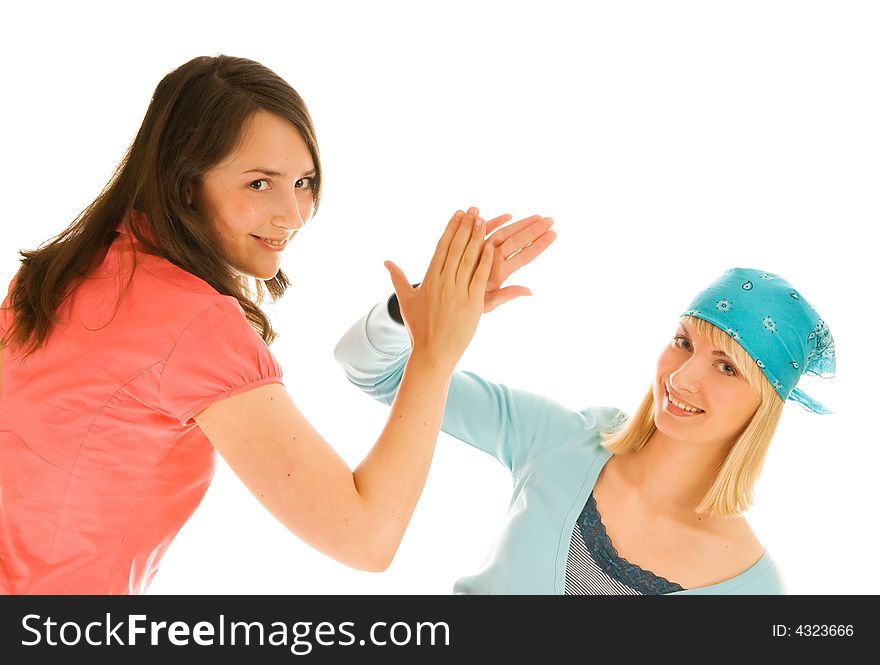 Two teenagers giving high five isolated on white background