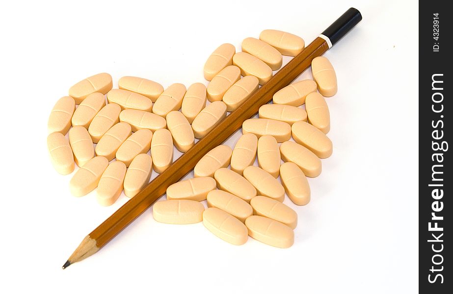 Heart Shape Pills Split With Pencil