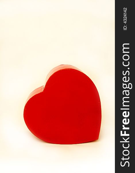 Red heart shaped box on an isolated white background