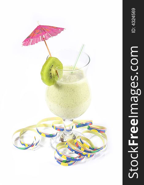 Kiwi cocktail with pink paper umbrella