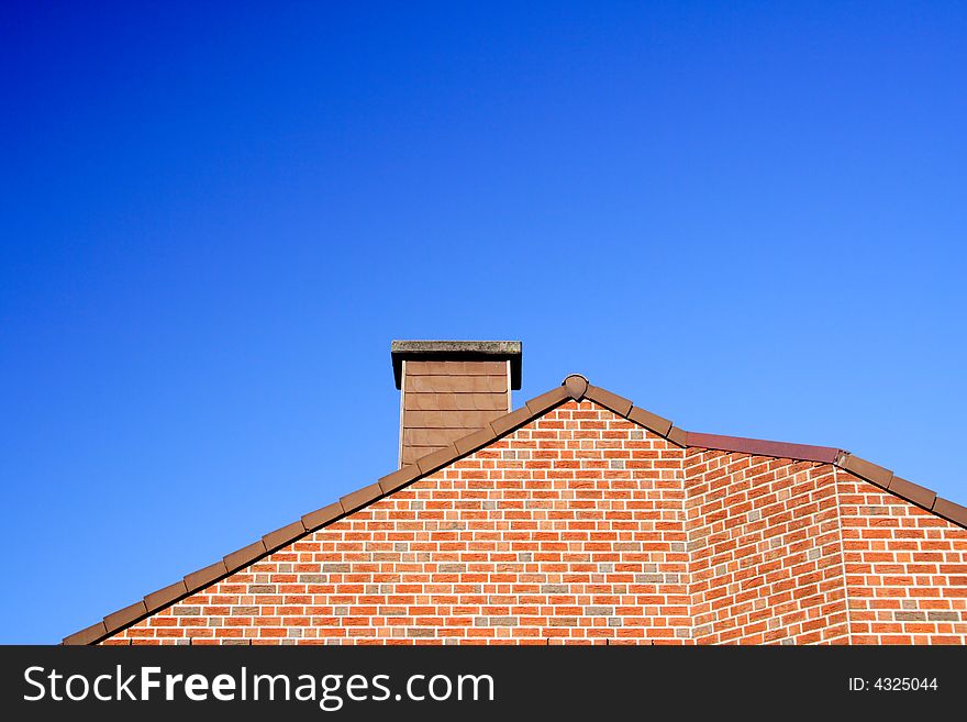 Roof with a chimney with blue sky