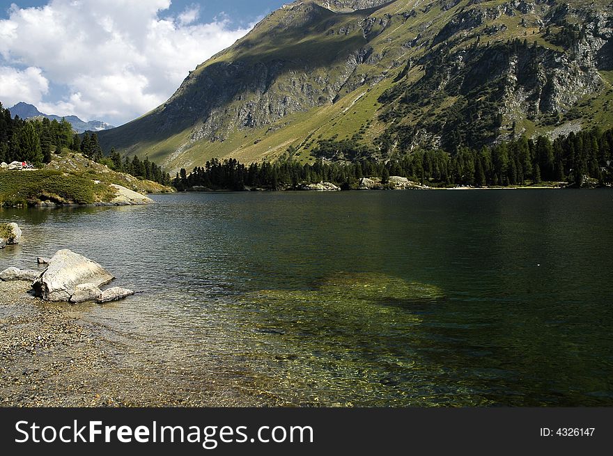 A beautiful mountain lake in Alps - Switzerland