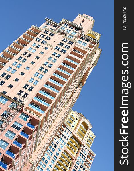 Luxurious high rise Condominiums with deep blue sky background. Luxurious high rise Condominiums with deep blue sky background