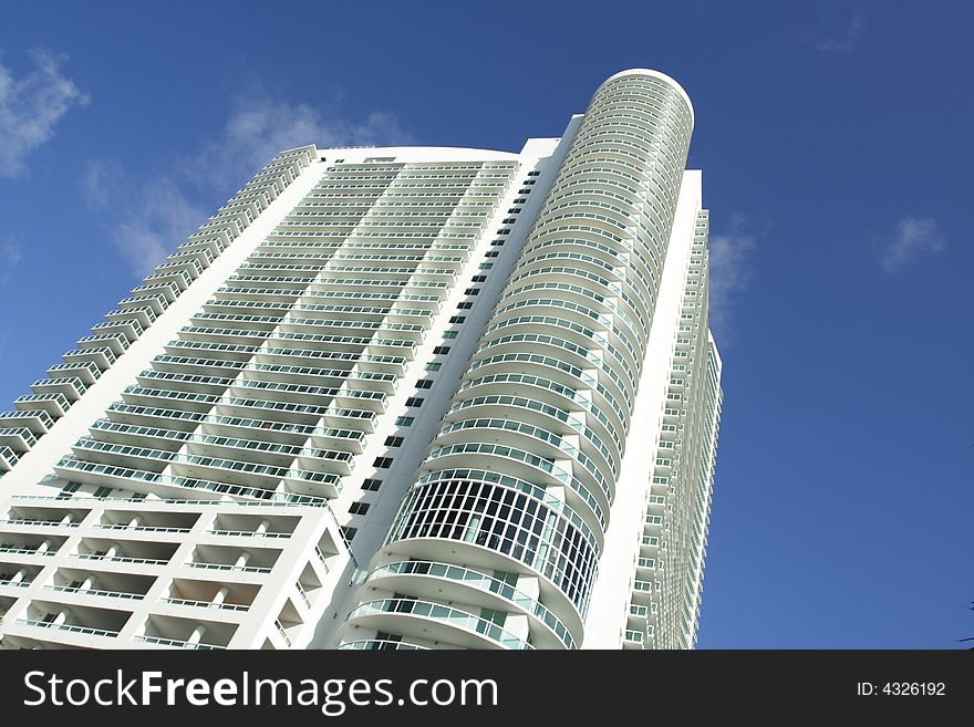 Abstract Building shot from below displaying brilliant blue sky.