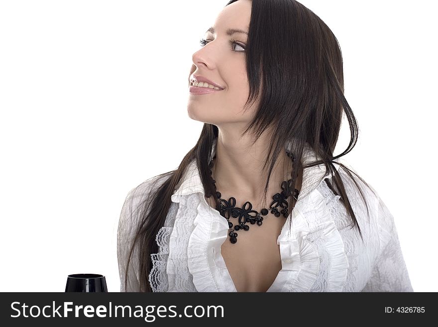 Beautiful lady with black tall glass staring up over white. Beautiful lady with black tall glass staring up over white