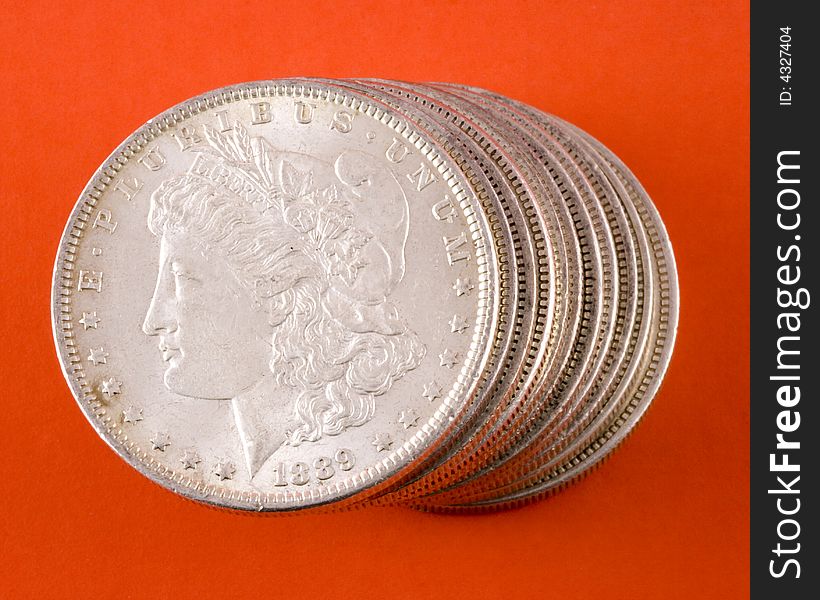 Closeup of a stack of Morgan silver US dollars. Closeup of a stack of Morgan silver US dollars.