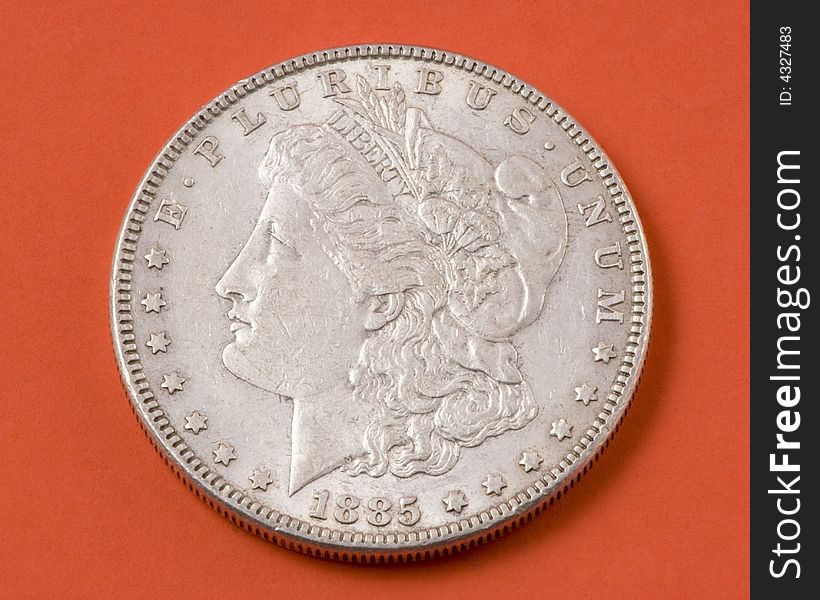 Closeup of a 1885 Morgan silver US dollar. Closeup of a 1885 Morgan silver US dollar.