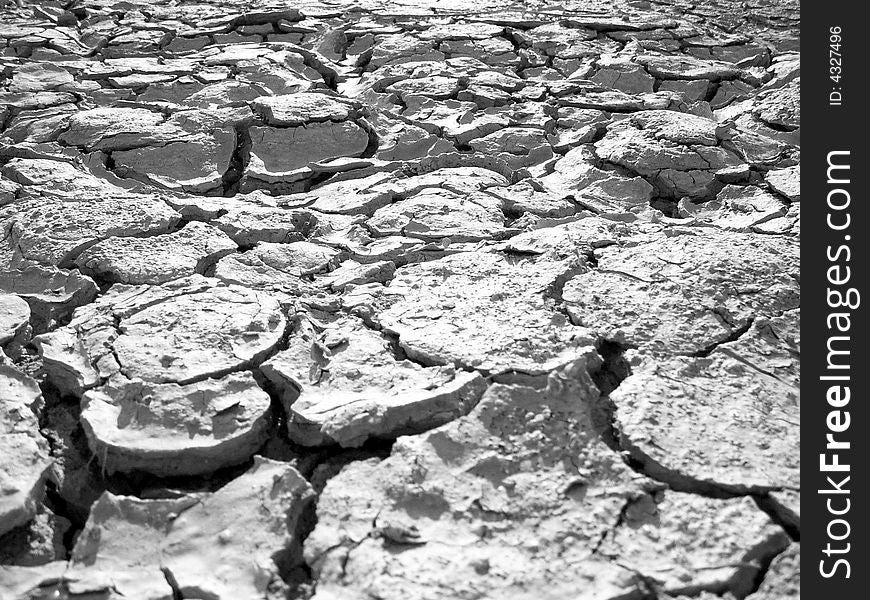 This dried white mud was lake of wastes in the past. Now ground dry out and splits covering earth just like scars. Good for illustrating global warming and climate changes effects. This dried white mud was lake of wastes in the past. Now ground dry out and splits covering earth just like scars. Good for illustrating global warming and climate changes effects.