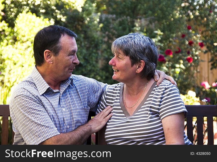 Elderly couple on a bench