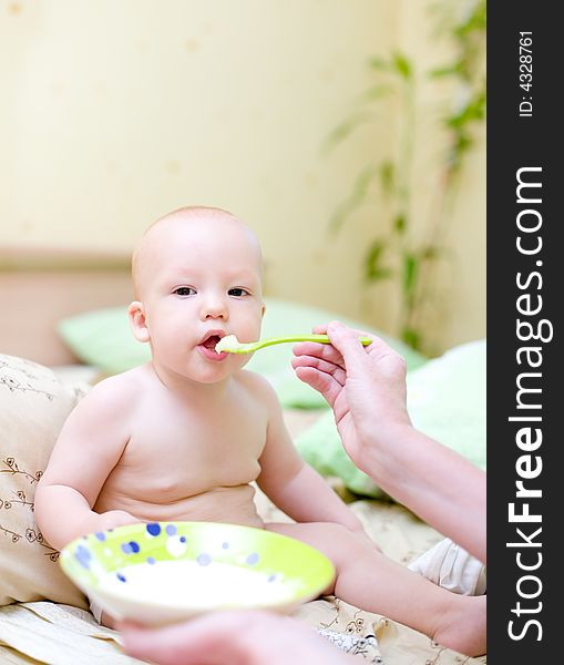 Mother Feed Baby By Porridge