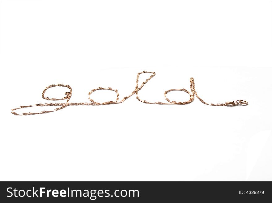 A gold word hand lettering by chain