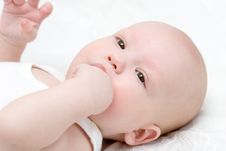 Baby Draw Your Fist Into The Mouth 2 Royalty Free Stock Photos