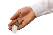 Key With Charm In Hand Stock Photos