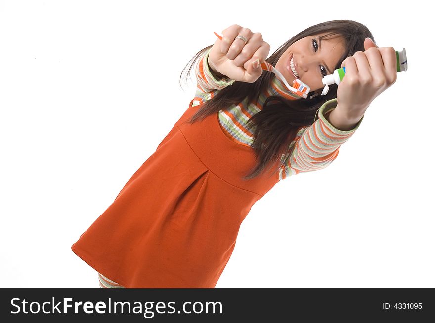 Young brunette girl with tooth brush in hand. Concept of tooth care and oral hygiene. Young brunette girl with tooth brush in hand. Concept of tooth care and oral hygiene.