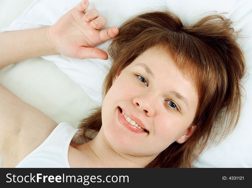 Relaxing woman in white bed. Relaxing woman in white bed