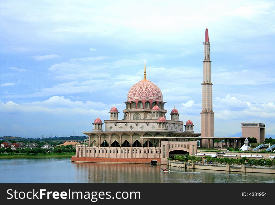 Mosque by lakeside with blue sky at Putrajaya malaysia. Mosque by lakeside with blue sky at Putrajaya malaysia