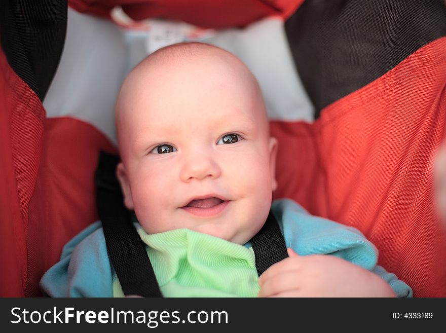 Baby sitting in stroller