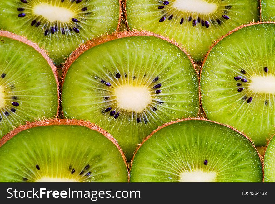 Ripe kiwi fruit slices in order. Ripe kiwi fruit slices in order