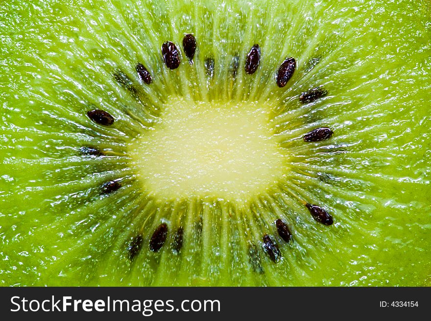 Macro of ripe kiwi slice. Macro of ripe kiwi slice