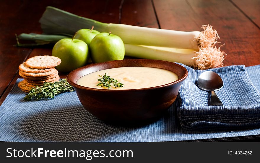 Apple and Leek Soup on a rustic table