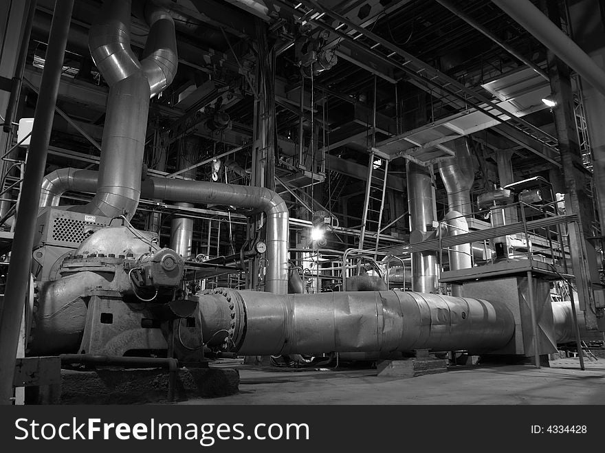 Different size and shaped pipes at a power plant. Different size and shaped pipes at a power plant