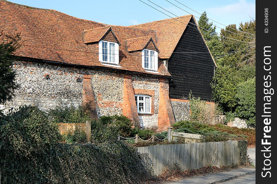 Traditional Brick and Flint Enlish Rural House and Garden. Traditional Brick and Flint Enlish Rural House and Garden