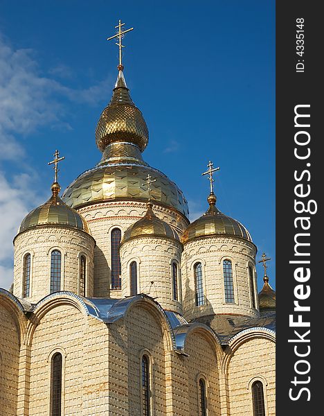 Golden domes and crosses over russian or ukrainian church