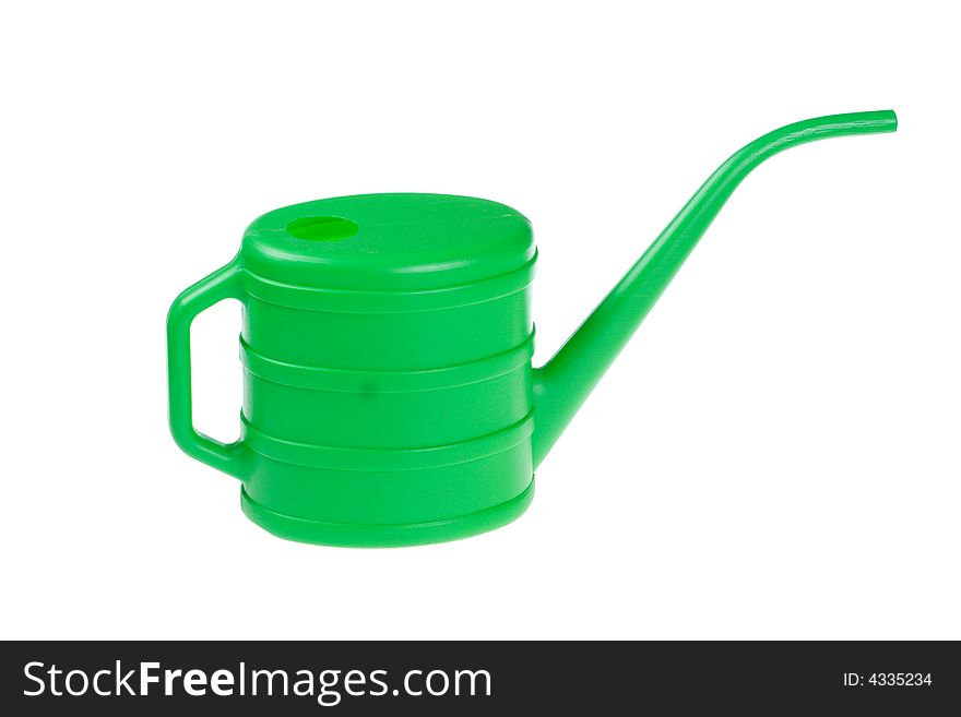 The green watering can isolated on a white background