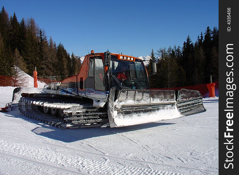 Snow Cat, Piste basher / groomer at work in La Plagne, French Alps