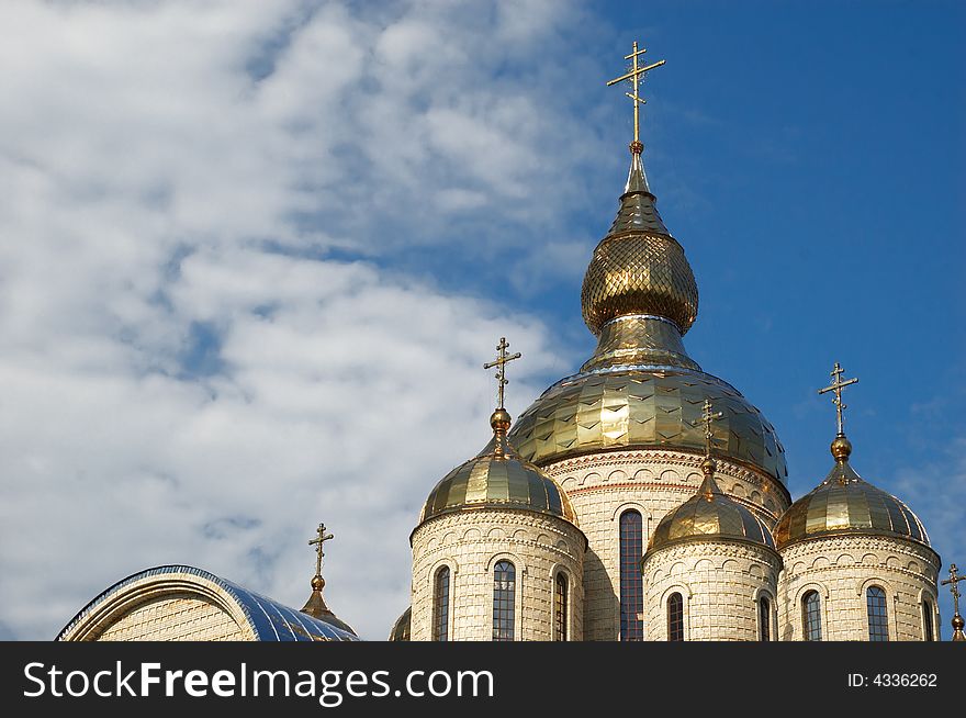 Golden domes and crosses over russian or ukrainian church