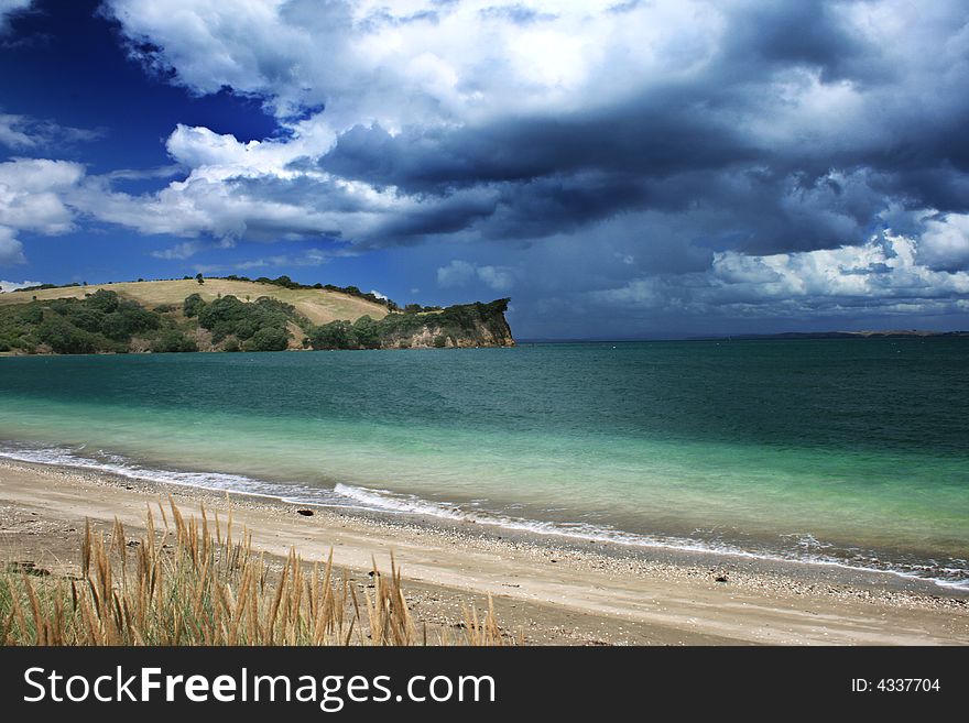 An imposing storm cloud approaching the beach. An imposing storm cloud approaching the beach