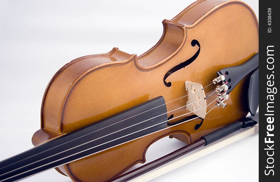 Close-up of Violin and Bow on white background