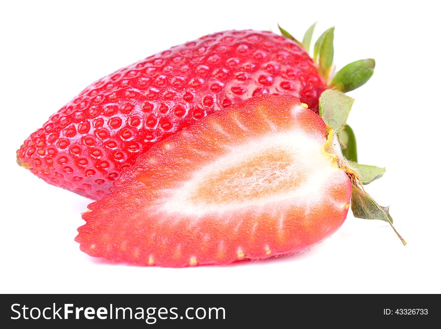 Tasty and useful strawberry on a white background. Tasty and useful strawberry on a white background