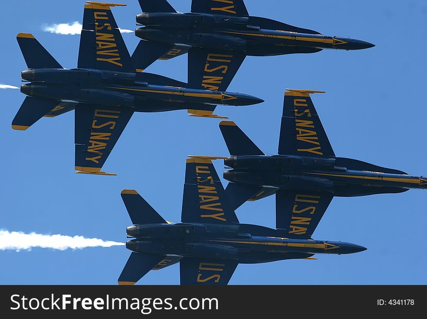 Blue angels fighter jet performing. Blue angels fighter jet performing.