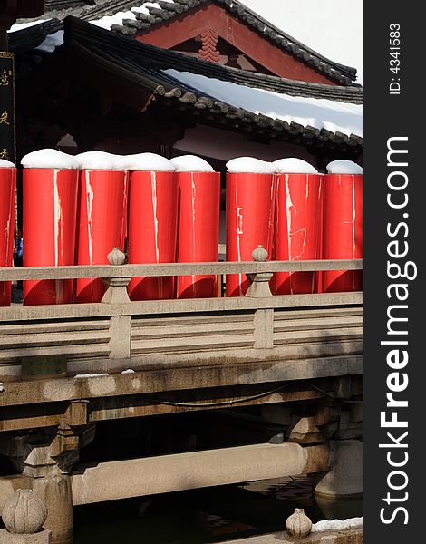 Candles are standing in front of the Hanshan Temple. This picture is taken in Hanshan Temple in Suzhou ,China.