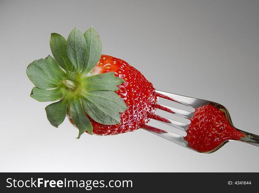 Fresh Strawberry on a fork