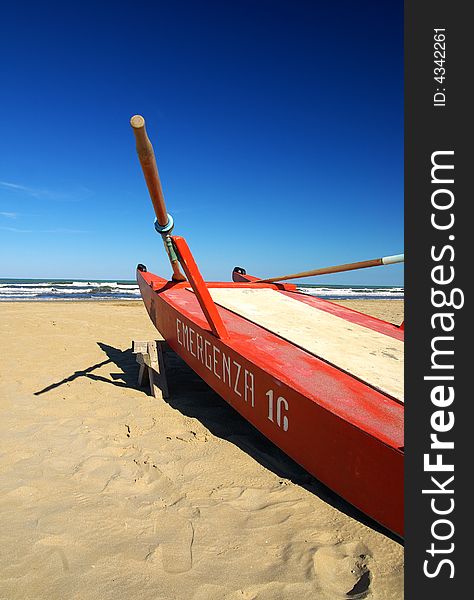 Red Boat On The Beach