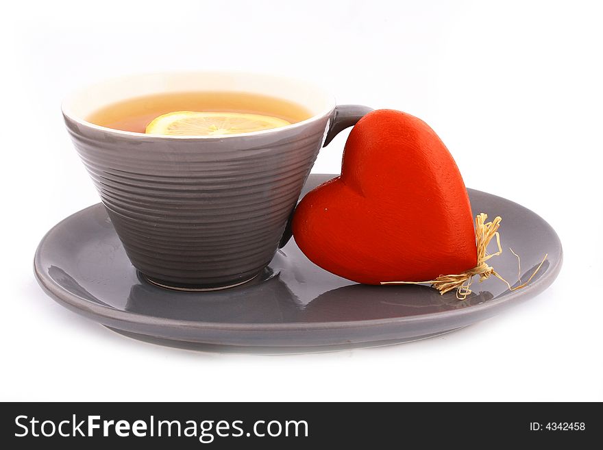 Cup of tea and red heart