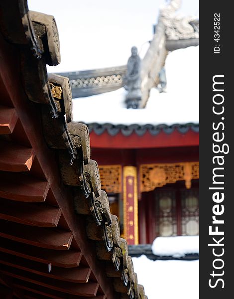 The roof of some ancient houses decoated with snow.This picture is taken in Hanshan Temple in Suzhou ,China.