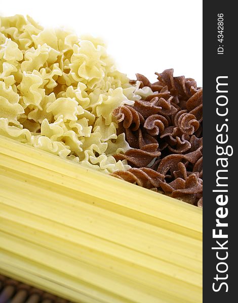 Assorted pasta still life over white background