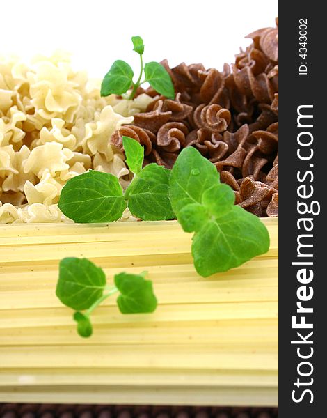 Assorted pasta still life over white background