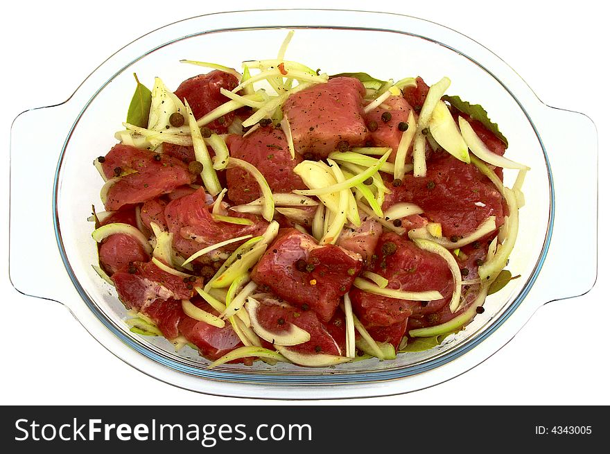 Meat in glass on a white background with path
