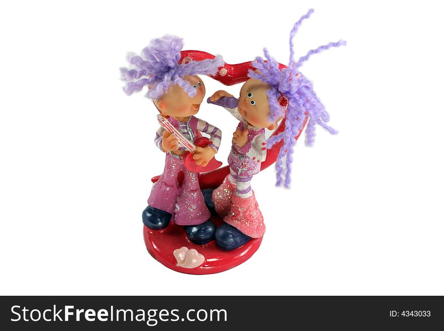 Statuette: A pair of teenagers singing. Statuette: A pair of teenagers singing