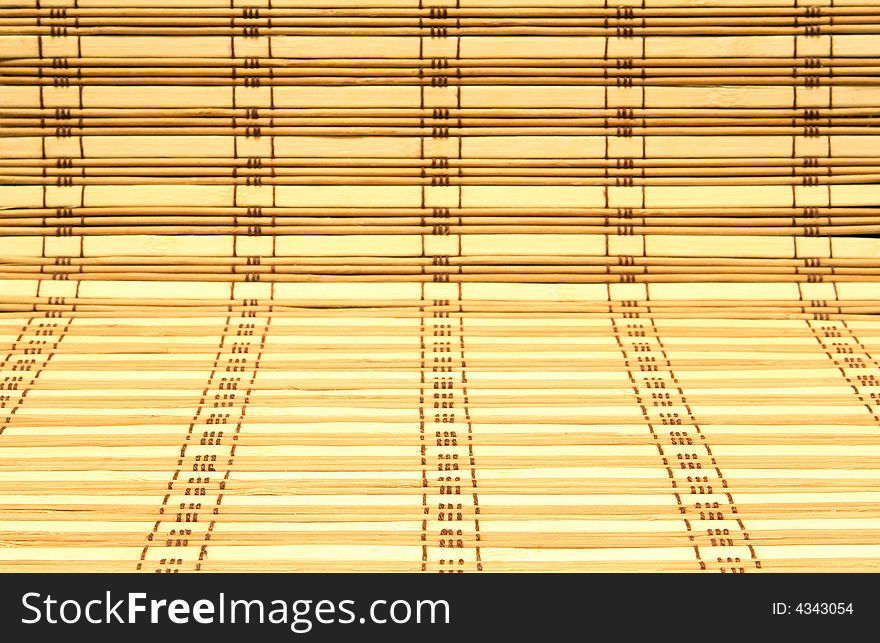 Beautiful background from thin wooden sticks