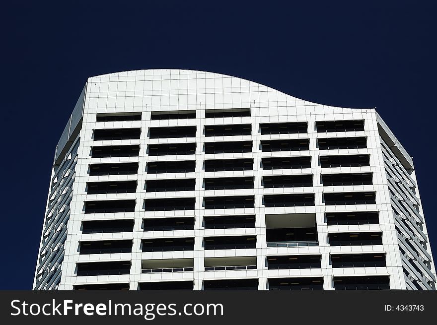 Modern corporate building against the sky background