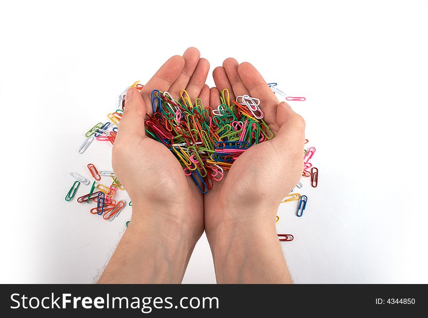 Hands holding paper clips isolated on white