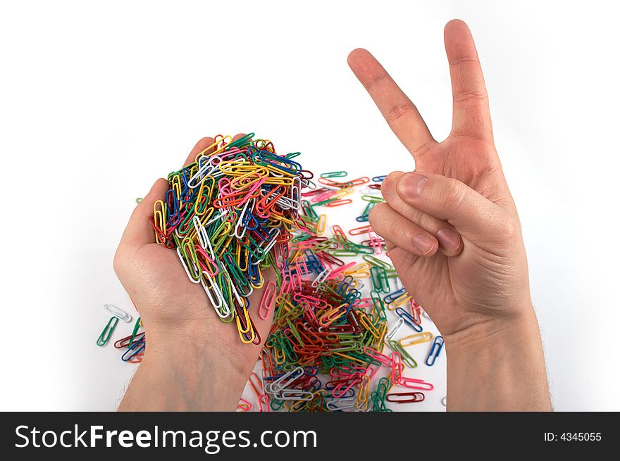 Hands holds paper clips and gives gesture 4