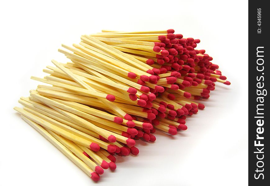 A large pile of red-tipped cooks matches