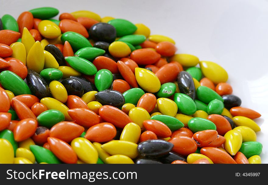 Small colorful sweetmeats on saucer